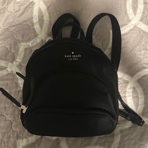 Kate spade backpack purse 2 compartments with zippers and front compartment